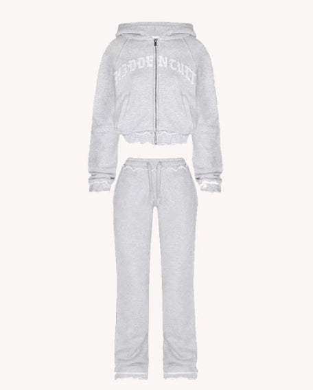 Light grey women's lounge set with zip hoodie and jogger pants, cozy comfort fashion at FashionRay