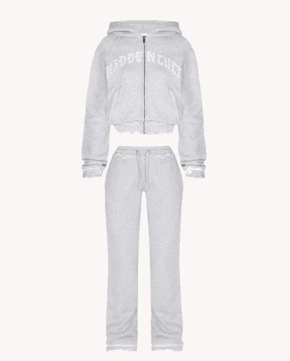 Light grey women's lounge set with zip hoodie and jogger pants, cozy comfort fashion at FashionRay