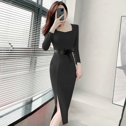 Woman in sleek black long-sleeve bodycon dress with side slit, posing indoors by window at FashionRay
