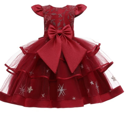 Elegant red toddler dress with tulle layers, large bow, and delicate star embroidery, FashionRay.