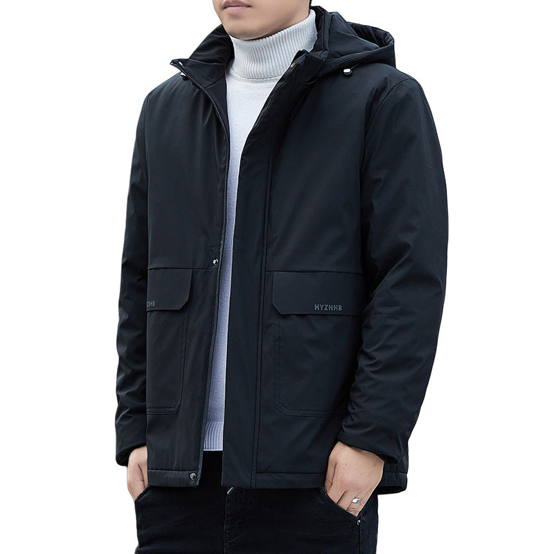 Man wearing black hooded jacket over white turtleneck, trendy outerwear from FashionRay