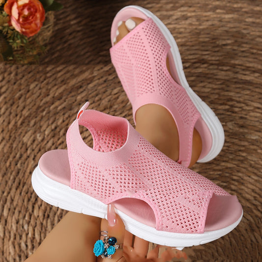FashionRay pink knit mesh open-toe sandals with white sole, displayed on woven surface