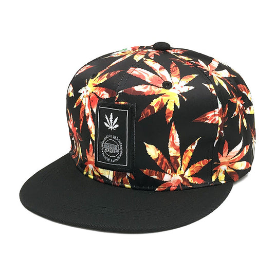 Black snapback cap with vibrant orange and yellow leaf print, FashionRay street style accessory