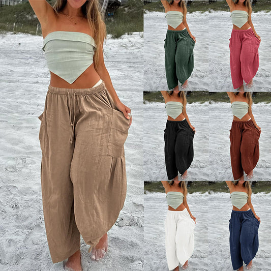 Woman on beach wearing loose drawstring pants and bandeau top in multiple colors, FashionRay style
