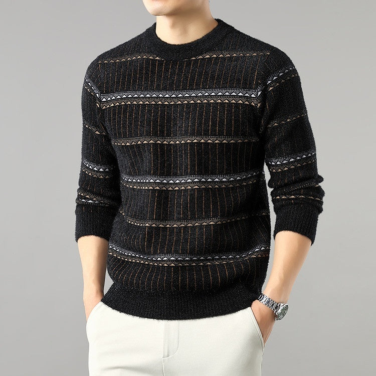 Man wearing black patterned sweater and light pants, FashionRay stylish men's winter outfit