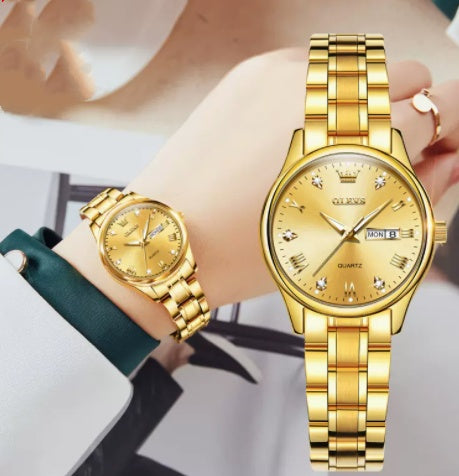 Elegant gold wristwatch with diamond markers on a woman's wrist, FashionRay accessory style