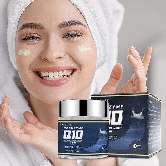 Smiling woman in towel with Coenzyme Q10 night cream, skincare promotion for FashionRay.