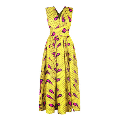 Yellow sleeveless maxi dress with bold pink and brown geometric pattern, FashionRay style