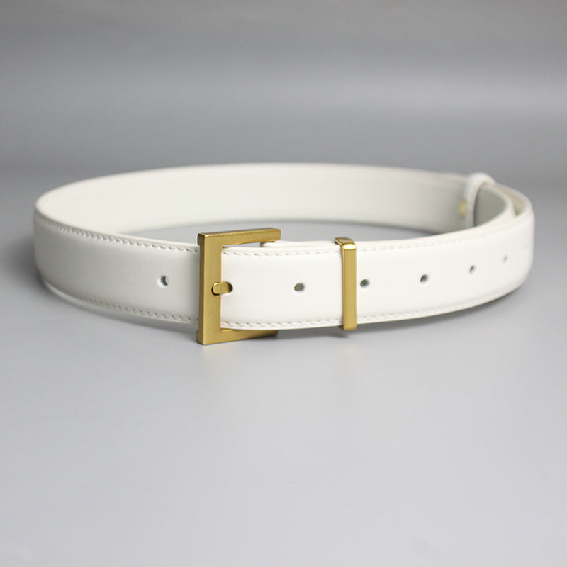 White leather belt with gold buckle on plain background, FashionRay trendy accessory
