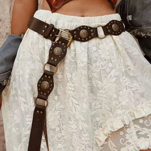 Boho brown studded belt over white lace skirt, trendy fashion from FashionRay