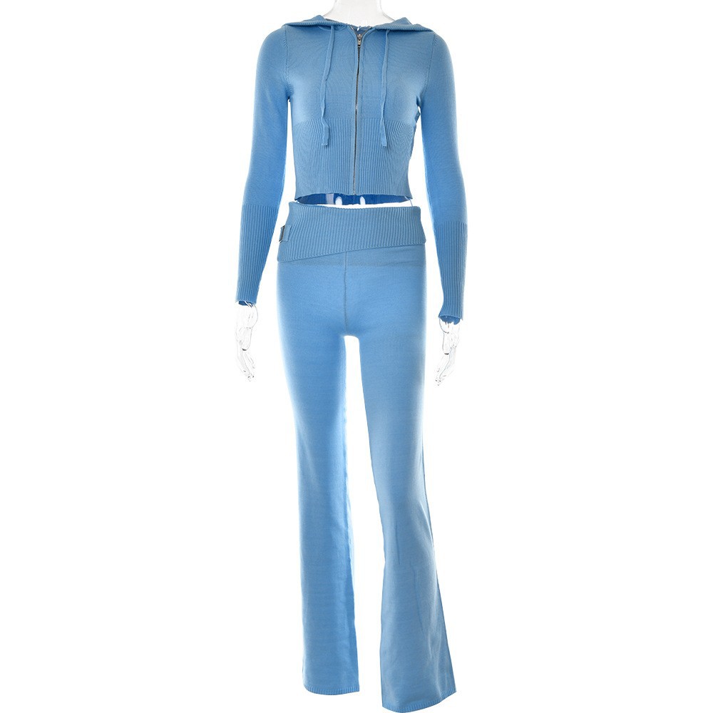 Light blue ribbed knit two-piece set with zip-up cropped hoodie and flared pants on mannequin