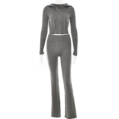 Gray ribbed knit two-piece set with zip-up hoodie and flared pants on mannequin, FashionRay