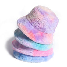 Stack of pastel faux fur bucket hats, trendy and colorful, FashionRay style accessory