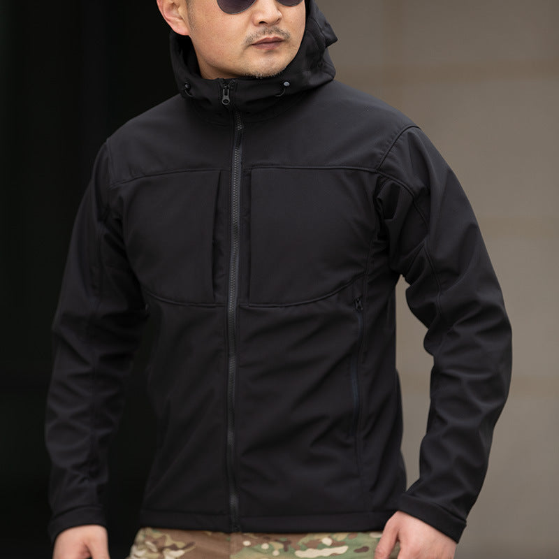 Man wearing a black hooded jacket and sunglasses, showcasing FashionRay outerwear style