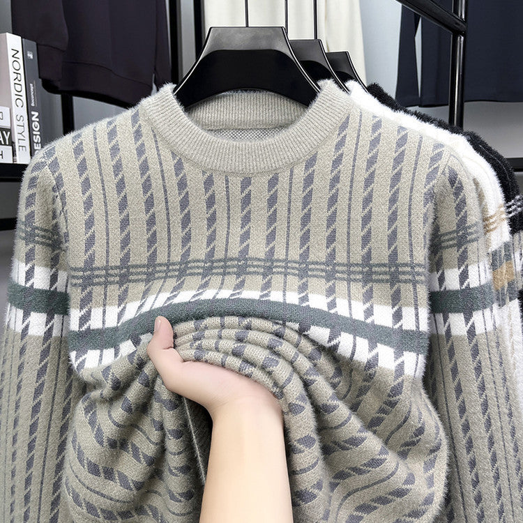 Soft plaid knit sweater in neutral tones on hanger, showcased at FashionRay clothing store